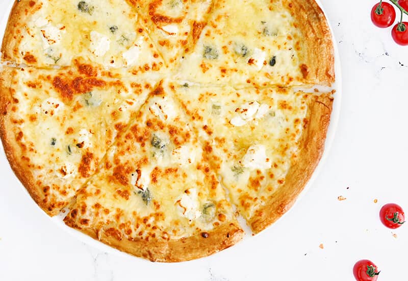 La 4 Saisons N'est Pas Qu'une Pizza Pizza Creamy 4 Cheese - Domino's Pizza